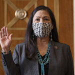 Rep. Deb Haaland, D-N.M., is sworn in before the Senate Committee on Energy and Natural Resources hearing on her nomination to be Interior Secretary, Tuesday, Feb. 23, 2021 on Capitol Hill in Washington. (Jim Watson/Pool via AP